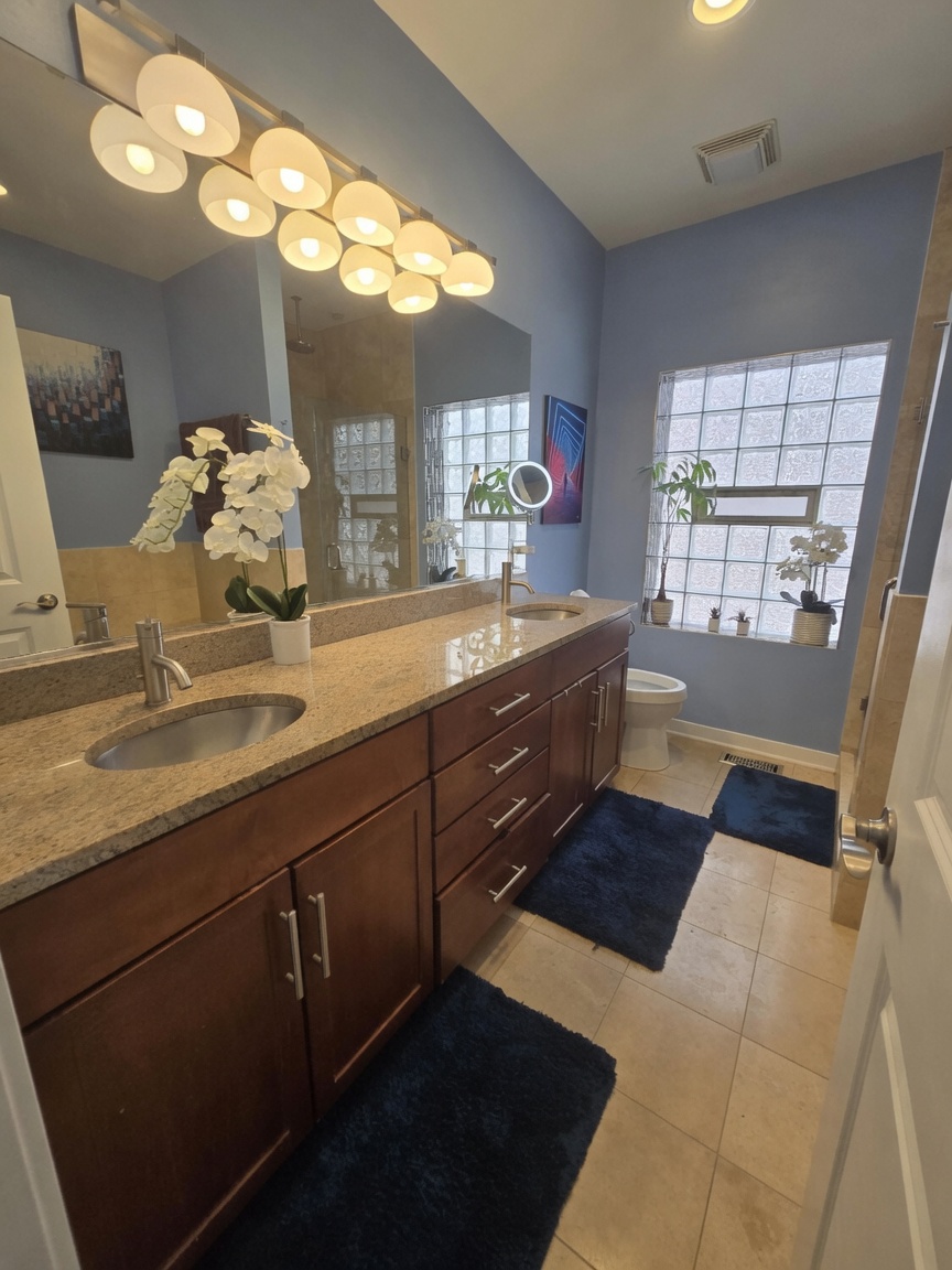 Primary bath double vanity with granite counter