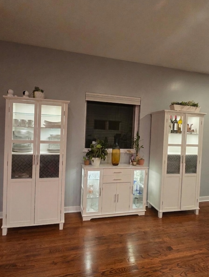 Custom lighted kitchen cabinets with glass doors